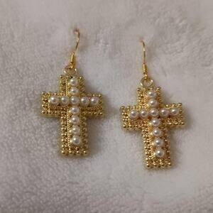Gold tone cross with white